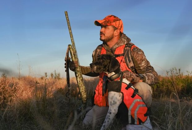 chien de chasse avec son maitre